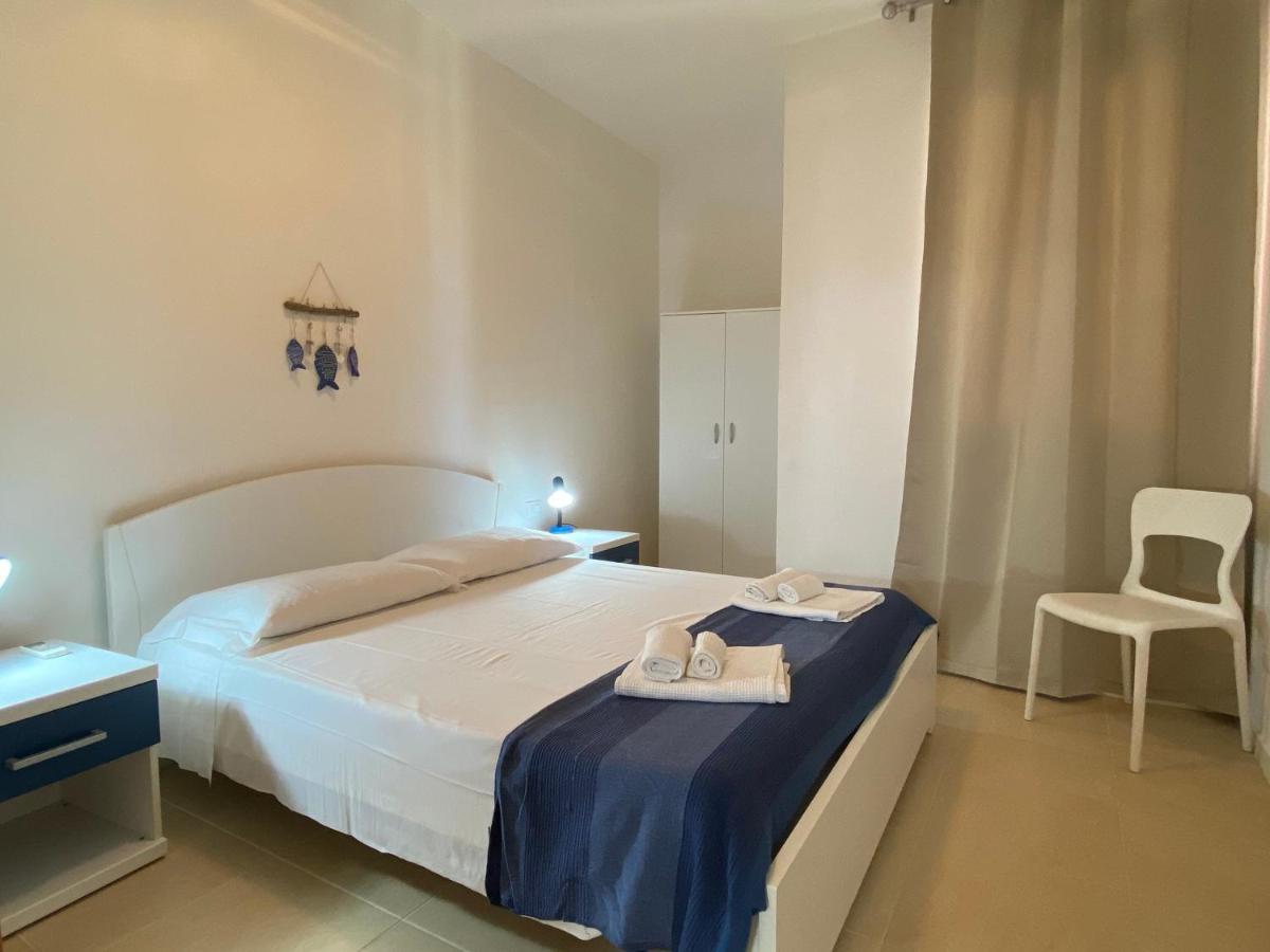 Sabrina Apartments Porto Pino Luaran gambar